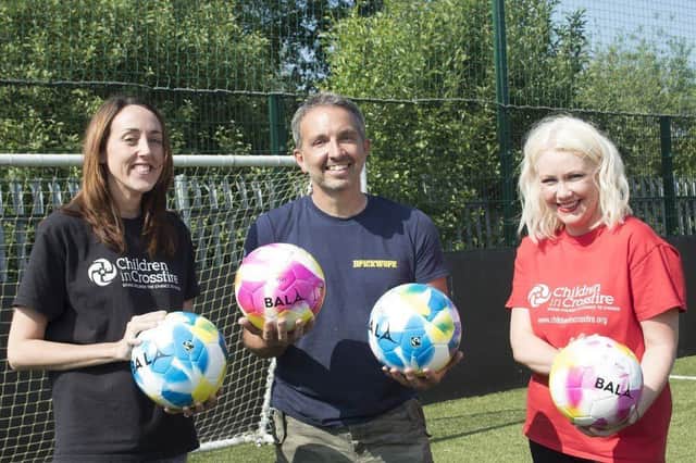 Shauna Taylor and Eileen Warren from Children in Crossfire, with Damien McLaughlin from Brickwork who will be taking part.