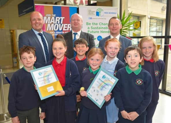Pictured (L-R) Thomas Campbell (St Colums Primary School pupil), John Thompson (Translink), Rosie Crocker (St Colums Primary School pupil), Nigel McAfree (Translink), John Campbell and Rose McKenna (St Colums Primary School pupils), Dr Ian Humphreys (CEO of Keep Northern Ireland Beautiful), Laura Dysart, Ryan and Trasa Passmore (St Colums Primary School pupils).