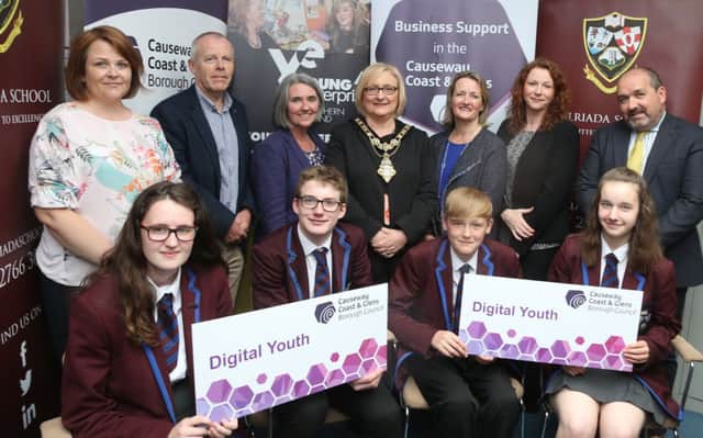 Pictured at the launch of a new Digital youth programme with The Mayor of Causeway Coast and Glens Borough Council, Councillor Brenda Chivers are Mrs Clare Kelly, Dalriada Grammar, Martin Clark, Business Development Manager, Causeway Coast and Glens Borough Council, Jane Hanna, Young Enterprise, Carol Fitzsimmons MBE, Young Enterprise Chief Executive, Bridget Mc Caughan, Economic Development Officer, Causeway Coast and Glens Borough Council, Mr John Devlin, Dalriada Grammar and Year 11 pupils from Dalriada Grammar in Ballymoney.