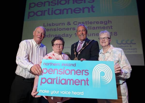 Mayor of Lisburn and Castlereagh City Council, Cllr Uel Mackin, is pictured at the Lisburn and Castlereagh Pensioners' Parliament with Hugh Russell from Carryduff, Mary Marr from Lisburn and Rose Holt from Lisburn.