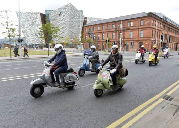 Scooter enthusiasts from around the world pictured as they leave Titanic Belfast on a ride out which will end at Cultra.
 Photo: Presseye/Stephen Hamilton