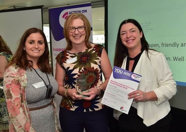 Laura Murphy, Action on Hearing Loss, Angela Hamilton (centre), and Jackie White, director at Action on Hearing Loss Northern Ireland.