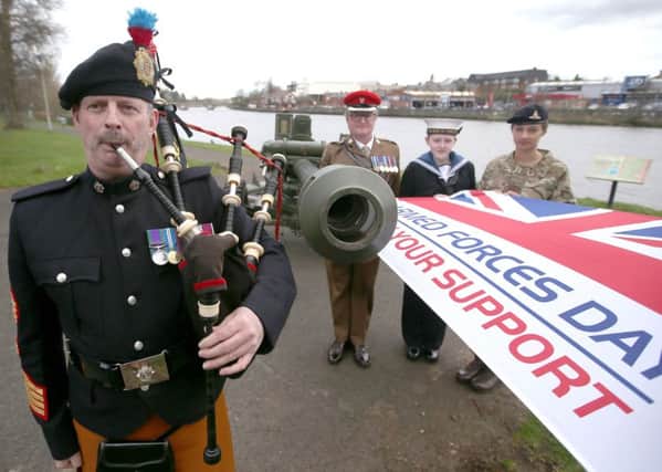 Preparing for Armed Forces Day which will take place in Coleraine on Saturday 23 June are Pipe Major Wallace, 152 (North Irish) Regiment The Royal Logistic Corps, along with Major JD Taylor and cadets Athena Dunlop and Laura Pipinska.