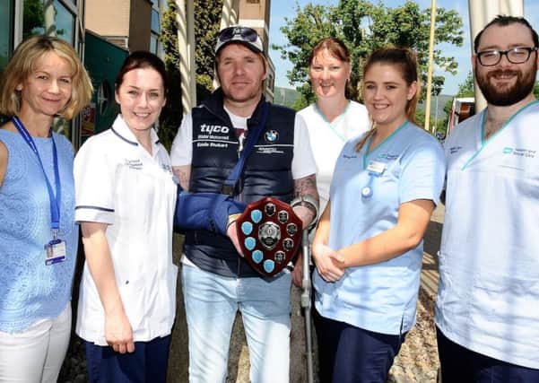 From left to right  Dr. Suzanne Maguire ( consultant ),  Carmel Lavery ( occupational therapist ),  Steven Lynd, Julie Morton ( occupational therapist ),  Olivia Connolly ( staff nurse ) and Chris Delaney ( health care assistant )