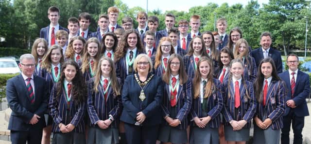 Coleraine Grammar School Rowing Team pictured with the Mayor of Causeway Coast and Glens Borough Council, Councillor Brenda Chivers, Dr David Carruthers, Coleraine Grammar School principal, Jeremy Johnston, Head Rowing Coach and Ross Cochrane, Assistant Rowing coach.