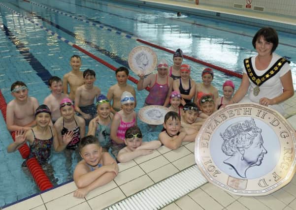 Pupils from St Patrick's Primary School, Armagh joined Madam Lord Mayor Cllr Julie Flagherty in Orchard Leisure, Armagh to promote the Â£1 Swim. Â©Edward Byrne Photography