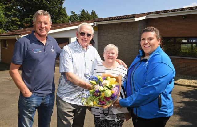Dromore residents, Bill and Carol Collins, of Ballymacormick Road, are congratulated by Jane Kilpatrick, Energy Advisor at Phoenix Natural Gas, and Sean McGeough of SP Plumbing & Heating on being the first Dromore customer to connect to the natural gas network as part of a major expansion project by the company to extend the pipeline to 13 towns across County Down.