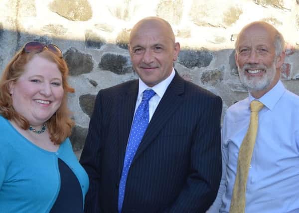 John Blair (centre) with party colleagues Naomi Long and David Ford.