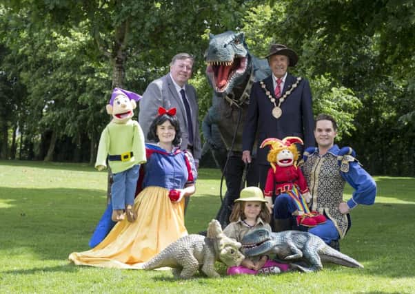 Pictured at the laucnh of Park Life 2018 are: Alderman Paul Porter, Chairman of the Council's Leisure & Community Development Committee; Roary the T-Rex; the Mayor, Councillor Uel Mackin; Phia Johnston, Reggy the T-Rex and Terry theTriceratops from Jurassic Hire; Mr Hullabaloo and Snow White.
