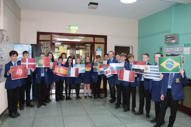 Year 8 students who presented World Cup flags at the Loreto College End of Year Mass.
