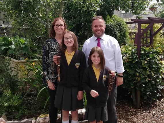 Denise, Grace and Lucy with school principal, Mr Patterson.