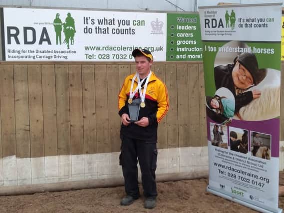 James Christie from Coleraine RDA with his Special Olympics Irish Gold Medals.