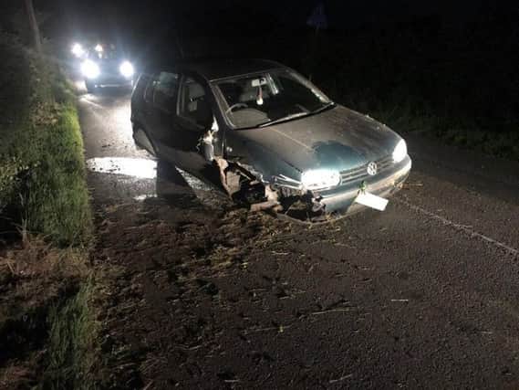 Car collided with trailer after encountering agricultural machinery