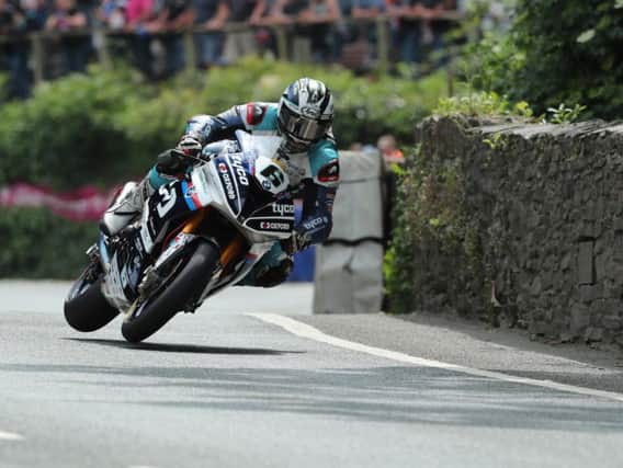 Michael Dunlop won three races at the Isle of Man TT to move onto 18 victories overall, making him the third most successful rider ever in the history of the event.