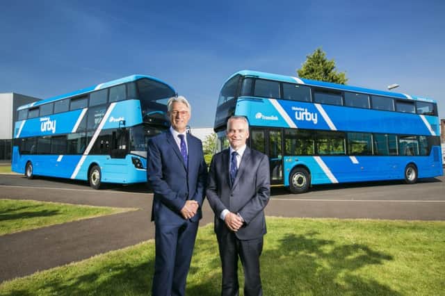 Translink is set to take delivery of 28 new high specification Ulsterbus Double Deck buses this Summer from Wrights Group.
Representing an investment of around Â£6.7million, the new buses will see the launch of the exciting new Urby brand, operating on key commuter routes between outlying towns including park and ride routes and Belfast. They will have a modern and striking new-look livery and come with a range of enhanced on board customer features for an even better journey experience.
Pictured in front of the new vehicles are Mark Nodder, Wrights Group Chairman and Chief Executive and Chris Conway, Translink Group Chief Executive. Picture by Brian Morrison.