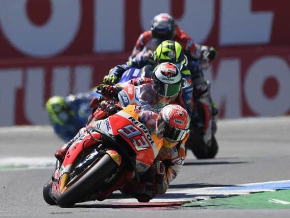 Marc Marquez wins a thrilling race in Assen