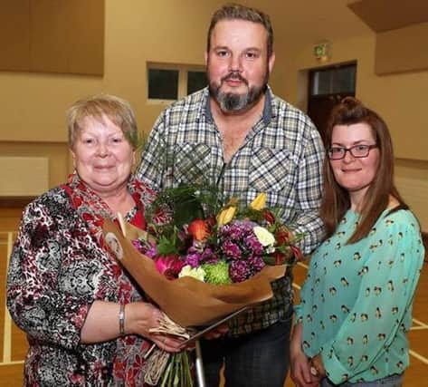 Mary Gillen was presented with a bouquet of flowers by the chair of Dervock and District Community Association Frankie Cunningham in recognition of her contribution.