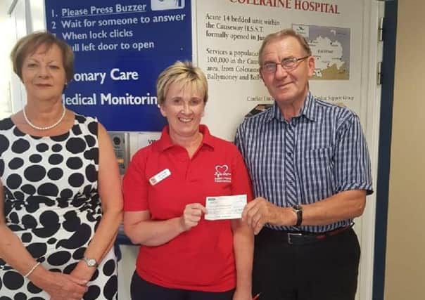 Brian and Kae McFetridge from Garvagh are pictured presenting a cheque for Â£740 in aid of British Heart Foundation NI to Joanne Glass, Heart Failure Nurse at the Causeway Hospital.