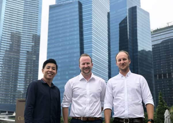 Kwok Zhong Li, Co-Founder and Managing Director of Finty; David Boyd, Co-Founder of Credit Card Compare; and Andrew Boyd, Co-Founder of Credit Card Compare pictured in Singapore to announce Credit Card Compares acquisition of Finty.