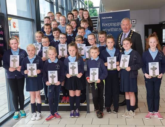 Councillor Sean McPeake Chair of Mid Ulster District Council meets with pupils from St. Patricks Primary School, Mullinahoe at the animation project launch.