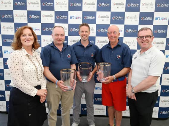 Sinead El Sibai from Dubai Duty Free and Barry Funston, Rory Foundation make a presentation to Brian King, Damian Fox and Dermot Davitt at the Pro-Am at Ballyliffin.