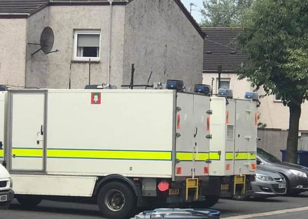 Army Technical Officers dealing with a pipe bomb attack at Enniskeen in Craigavon