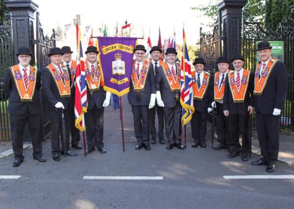 District Officers at the gates of Brownlow House as they get ready to set off on their morning Twelfth parade.