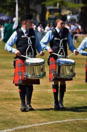 Aaron and John McLean from Ballymoney during FMM Pipe Band Drum Core winning performance.