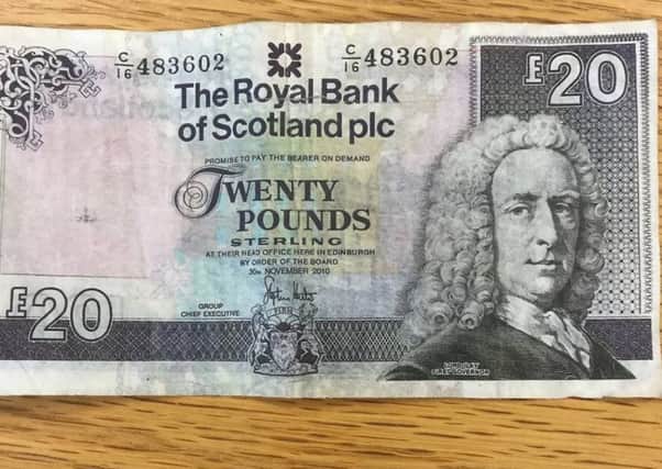 One of the counterfeit bank notes.