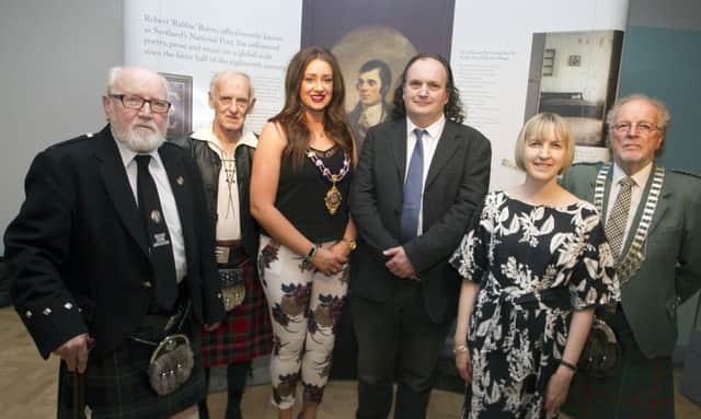 Mayor of Mid & East Antrim Council, UUP Cllr Lindsay Millar, pictured at the 'Hand To The Plough' exhibition along with from left, Tom Beckett (Vice-President Belfast Burns Association), William McPherson (Past President of BBA),Dr Frank Ferguson (Ulster University), Samantha McCombe (Linen Hall Librarian) and  Denis Currie, President of BBA.