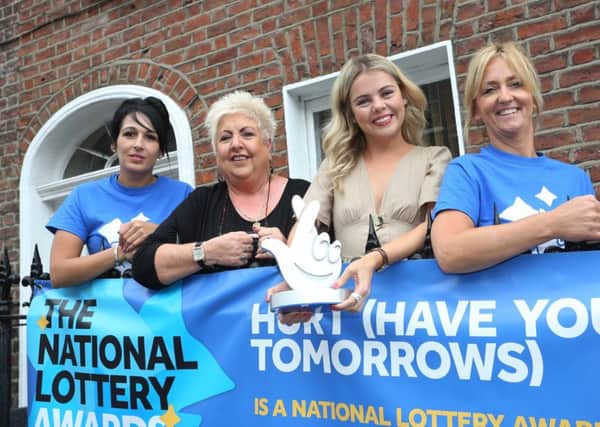 Derry Girl Saoirse Monica Jackson (Erin) visits National Lottery funded HURT (Have Your Tomorrows) family support group and suicide prevention charity, to support their bid to be named Best Health Project in the 2018 National Lottery Awards. Included, from left are staff members Tina Burns, Sadie O'Reilly and Pauline McCloskey.