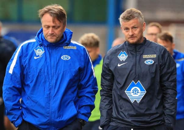 Molde's manager Ole Gunnar Solskjaer (right)