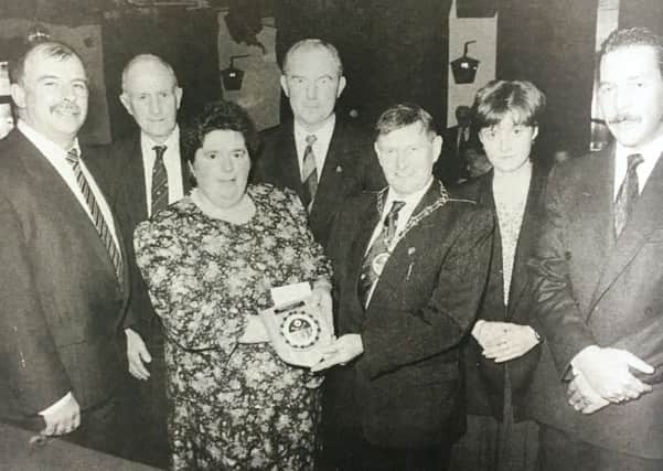 Mrs Margaret Mayne of Greenacres Guesthouse in Banbridge was presented with the runner-up award in the Ulster Tourist Development ASsociation Guesyhouse of the Year contest in 1992. She received the award from Councillor Maz Gault and is pictured with Ian McKay of Calor Gas, sponsors of the award, Councillor Robert Hill, Mr Ronnie Mayne, Judith Hanlon and Councillor John Dobson.