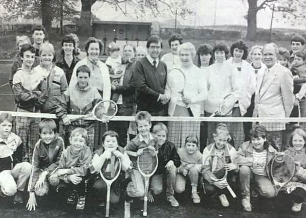 Rev Matthew Moore, chairman of Milltown Tennis Club and special guest Mrs Elizabeth Lappin get the season underway in 1988.