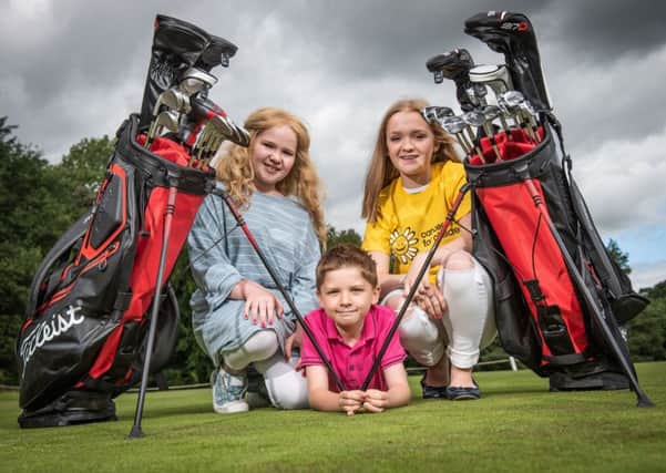 Molly, Ellie and Matthew Taylor, from Ahoghill, who received support from the Northern Ireland Cancer Fund for Chidlren during Mollys cancer diagnosis, announce the exciting news that the charity will benefit from a range of events and fundraising activity throughout the NI Open at Galgorm Castle.