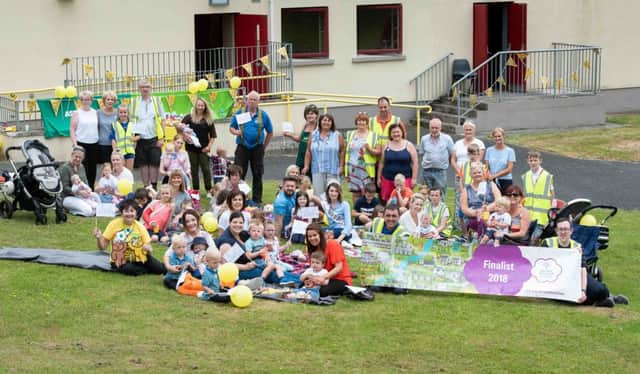 Organisers with families who attending the Teddy Bear's Picnic in Castlecaulfield.