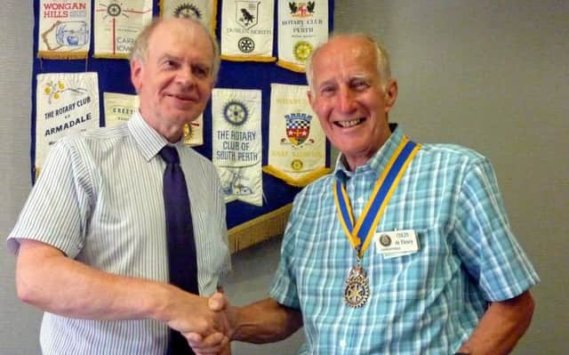 Outgoing president Jim Dunlop (left) congratulates Colin de Fleury as the new president of Carrickfergus Rotary Club for the 2018/19 Rotary year.