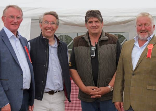 Enjoying Saintfield Show are, from left: Norman McBriar, president; Peter Lawson, Glenbrook Farm, host; Brian Hunter, chairman; and David Smyth, head of cattle section. Picture: Julie Hazelton