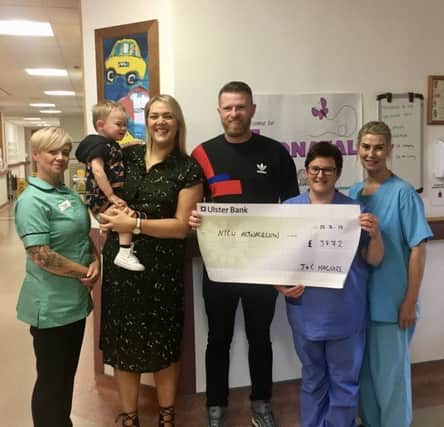 John, Chrissie and Bobby presented a cheque for Â£3,872 to staff of the NICU ward at Altnagelvin Hospital.