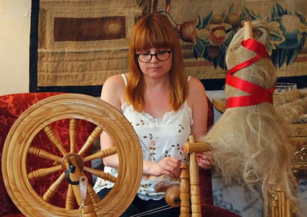 Gillian Topping, Assistant Education Officer from the Irish Linen Centre & Lisburn Museum showcasing her talent at hand spinning to the 2,000 guests at Villa Wolkonsky as part of the 92nd celebrations of the Queens birthday