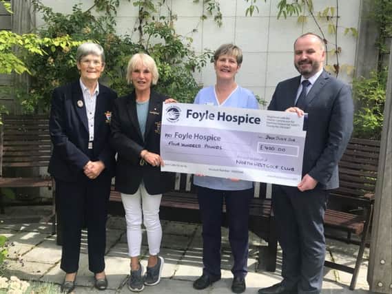 Eileen Moyles and Ann McCloskey from the North West Golf Club presenting a chq to Donall Henderson and Mary Willis Foyle Hospice. The money raised through a recent golf competition.