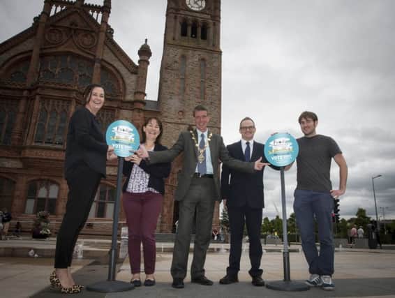 GET VOTING!. . . .The Mayor, Councillor John Boyle pictured at the launch of the Foodie Destinations 2018 Voting Call for Derry outside the cityÃ¢Â¬"s Guildhall on Tuesday morning. The city has been included in the top 10 finalists. Included from left are Catherine Goligher, Tourism Officer, Derry City and Strabane District Council, Aideen McCarter, Head of Culture, DCSDC, Mark Toye, General Manager, Bishop's Gate Hotel and Stephen Forbes, Mekong.