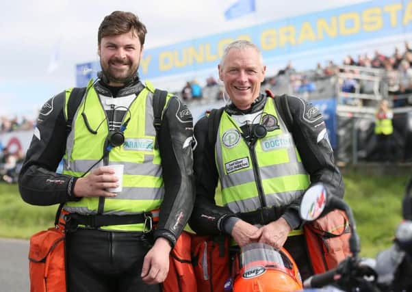 Allister MacSorley (left) with his father, Dr Fred MacSorley, at the Ulster Grand Prix.