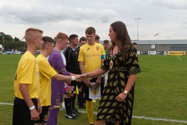 The Mayor of Mid and East Antrim, Cllr Lindsay Millar, is introduced to the Co Antrim team at Friday nights SuperCupNI finals.