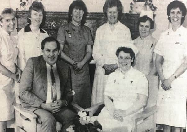 Mr Herbert Glass and his wife Joy with staff of Hockley Lodge Nursing Home in 1988,