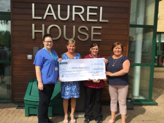 Pictured at the presentation of Â£4,000 to Laurel House at Antrm Area Hospital are Chemo Nurse Mandy Young, Mabel Campbell, Sister Samantha Ross and  Denise Kirkpatrick.