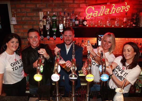 Nathan Carter is pictured with Fergal McVeigh, manager of Gallahers Lounge at Cityside Shopping Centre, Alex Best, Kirstie McMurray (Downtown Radio) and Lynette Fay (Radio Ulster)