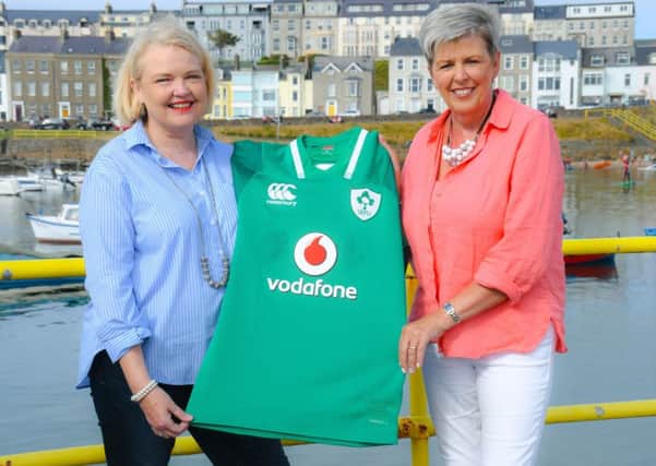 Dr Janine Stockdale and Dr Esther Reid from Queen's University Belfast, holding Jacob's Stockdale's Six Nations (Ireland vs England), recording breaking jersey; which will be auctioned for maternity services in Africa, at the SCRUMS for MUMS event in Queen's on the 29th August 2018.