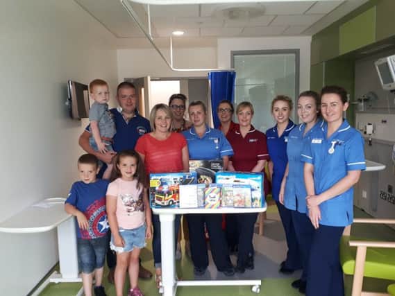 The family of Lucy Parke have made a donation of toys, games and staffroom equipment in memory of their daughter who was a patient and friend to the staff of the Childrens Ward at Daisy Hill Hospital.