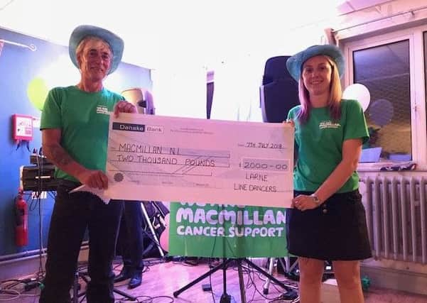 Larne Line Dancers raised an amazing Â£2000 for Macmillan at their Line Dance Charity Night in Larne Masonic Club on July 7. Pictured with the cheque are Brian McMullan and Vicki Tumilson